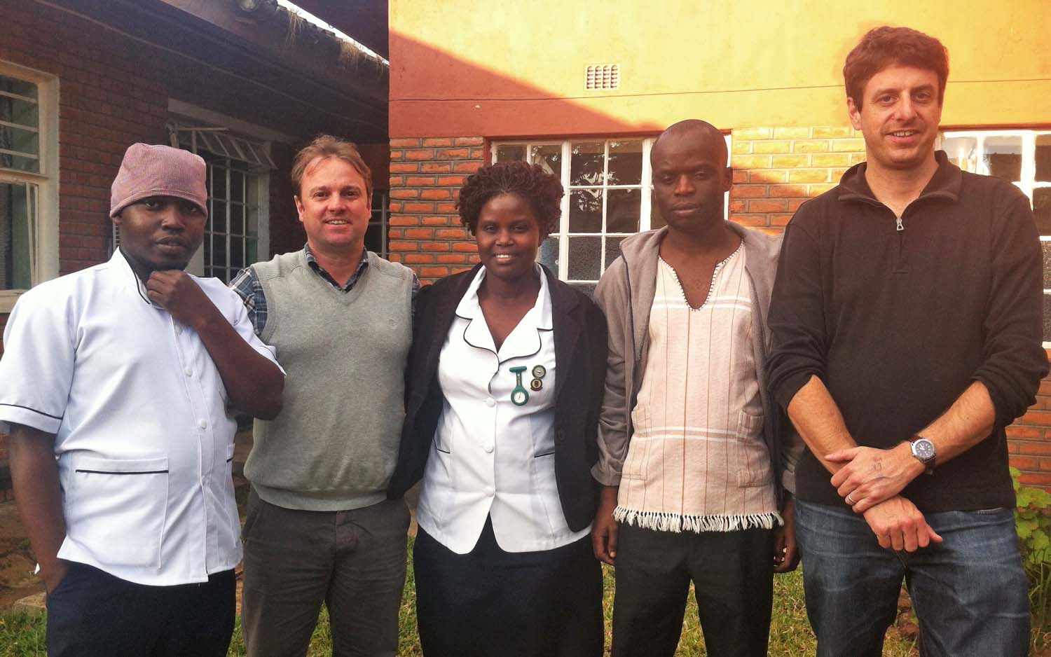 Roberto with colleagues and staff of the Queen Elizabeth Central Hospital (QECH) in Blantyre, Malawi.